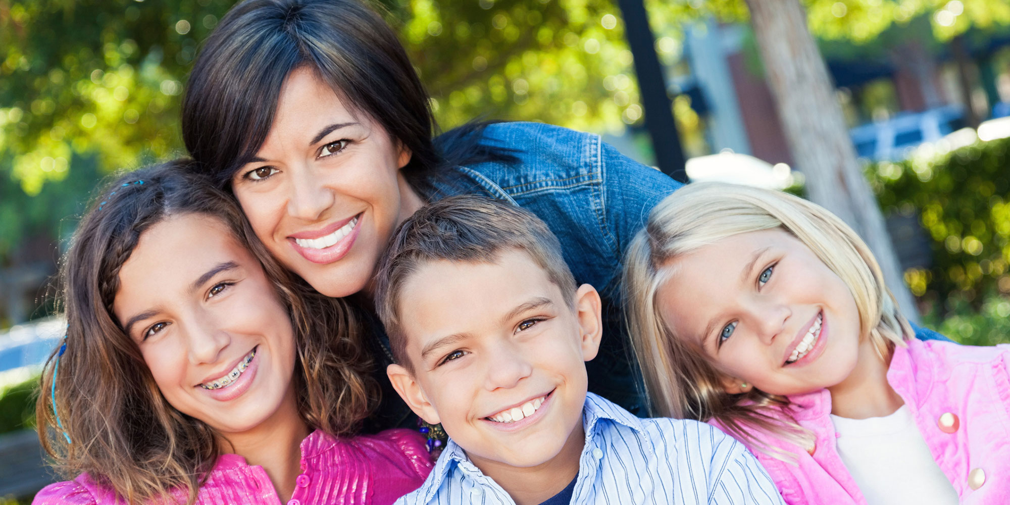 Mother with three smiling children
